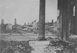 Ruins seen from the Circular Church, Charleston, SC, 1865. Source: U.S. National Archives and Records Administration (111-B-4667, public domain).